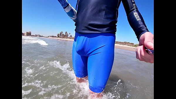 Men and women on the beach get horny seeing my cock in wet spandex