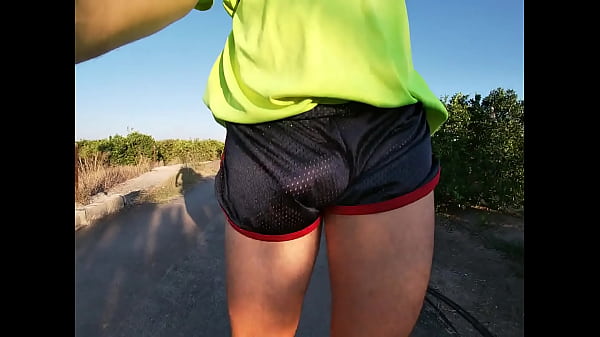 Tight shiny sport shorts bulging routine (freeballing in a public place)