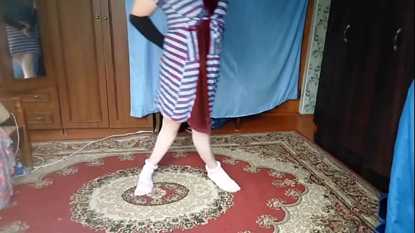 Cute sissy posing with colorful lollipop and smile