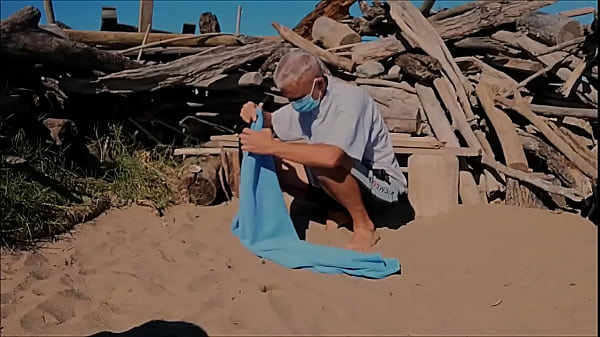 naked pathetic white slave in penis cage strip at the gay beach fucks himself with cucumber, CMNM